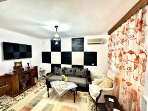 TV a/nebo společenská místnost v ubytování Grandpas House