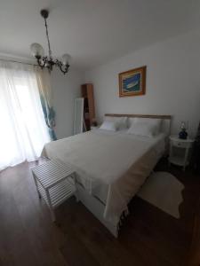Posteľ alebo postele v izbe v ubytovaní Apartments and rooms by the sea Rovinj - 19183