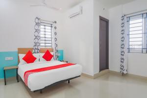 Postel nebo postele na pokoji v ubytování Hotel O Perfect Stay