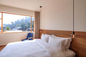 Hangzhou Moju Boutique Guesthouse at the West Lake客房内的一张或多张床位