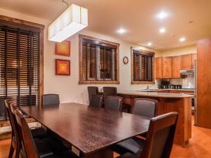 a kitchen and dining room with a table and chairs at Gouka Chalet in Kutchan +14 photos