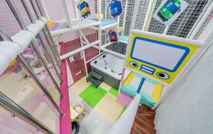 an overhead view of a toy house with a screen at Avianto kids poolvilla in Gapyeong