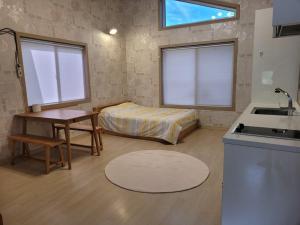 Η κουζίνα ή μικρή κουζίνα στο Sancheong Hangwon Pension