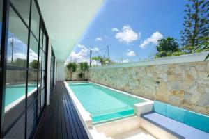 Swimmingpoolen hos eller tæt på Green Jimbaran Bay Villa III