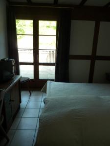 Letto o letti in una camera di Gasthof Löwen