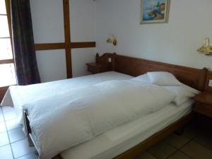 Letto o letti in una camera di Gasthof Löwen