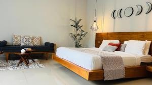 Ein Bett oder Betten in einem Zimmer der Unterkunft Villa Voyage 5