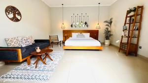 Ein Bett oder Betten in einem Zimmer der Unterkunft Villa Voyage 5
