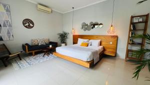 Ein Bett oder Betten in einem Zimmer der Unterkunft Villa Voyage 5