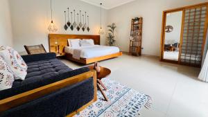 Ein Sitzbereich in der Unterkunft Villa Voyage 5