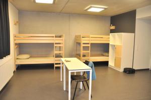 Kuchyň nebo kuchyňský kout v ubytování Hostel H