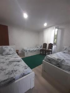 Voodi või voodid majutusasutuse HOTEL LukaRabati toas