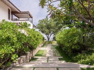 Zahrada ubytování Putahracsa Hua Hin