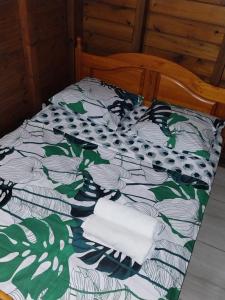 Postel nebo postele na pokoji v ubytování Bungalow Steens + 5 fotografií