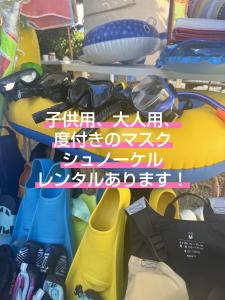 a display of shoes and other items in a store at やどバンブー in Hateruma