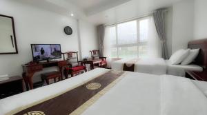 Postel nebo postele na pokoji v ubytování Sapa Lake View Hotel