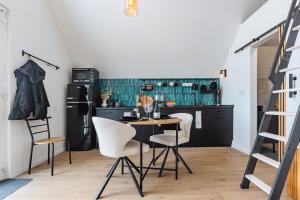 O bucătărie sau chicinetă la Tokajka Cottage