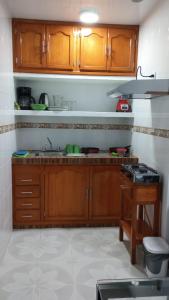 Kuchyň nebo kuchyňský kout v ubytování Orizaba Suites