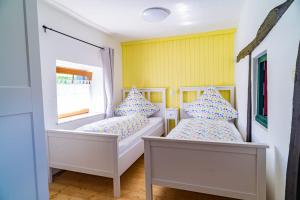 Ένα ή περισσότερα κρεβάτια σε δωμάτιο στο Ferienhaus Shiva