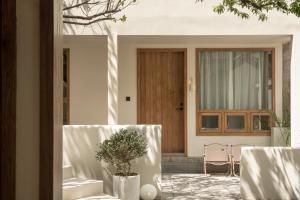 Posezení v ubytování Shijing Hotel in Dali-大理柿井美宿