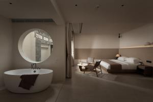 Koupelna v ubytování Shijing Hotel in Dali-大理柿井美宿