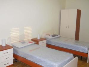 Ένα ή περισσότερα κρεβάτια σε δωμάτιο στο Catanzaro Lido - Trilocale Baia Azzurra