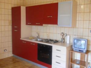 Η κουζίνα ή μικρή κουζίνα στο Catanzaro Lido - Trilocale Baia Azzurra