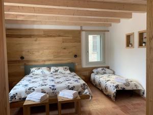 Postel nebo postele na pokoji v ubytování Borgo Cortivi b&b
