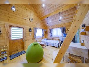 Postel nebo postele na pokoji v ubytování UMIOTO log