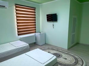Letto o letti in una camera di Mahdiy