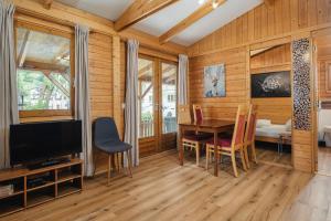 Posedenie v ubytovaní Camping Dreiländereck Blockhütten & Apartments