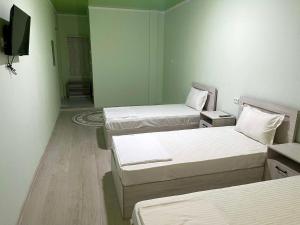 Letto o letti in una camera di Mahdiy