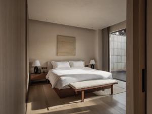 西安央辰酒店 Younch Hotel Xi'an客房内的一张或多张床位