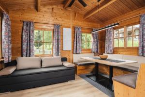 Posedenie v ubytovaní Camping Dreiländereck Blockhütten & Apartments