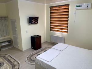 Letto o letti in una camera di Mahdiy