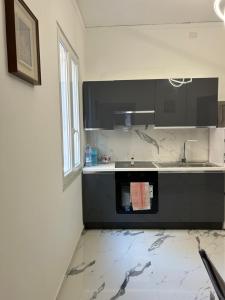 Η κουζίνα ή μικρή κουζίνα στο Luxury vista mare Sciacca centro +9 φωτογραφίες