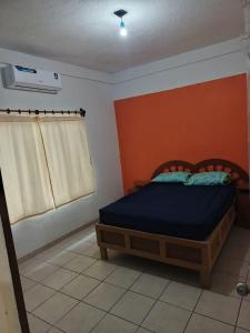 Postel nebo postele na pokoji v ubytování Casa de playa casitas