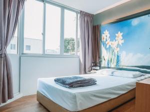 Postel nebo postele na pokoji v ubytování Hi Hotel Dot