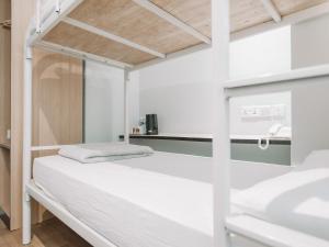 Postel nebo postele na pokoji v ubytování Hi Hotel Dot