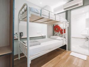 Postel nebo postele na pokoji v ubytování Hi Hotel Dot