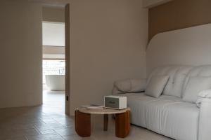Posezení v ubytování Shijing Hotel in Dali-大理柿井美宿