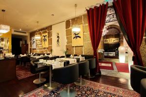 מסעדה או מקום אחר לאכול בו ב-Hotel Mestre de Avis