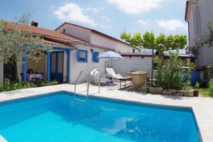 Πισίνα στο ή κοντά στο Ferienhaus mit private Swimingpool