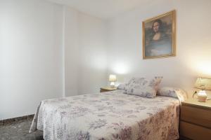 Postel nebo postele na pokoji v ubytování Apartamento Ramón