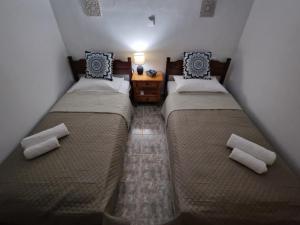 Postel nebo postele na pokoji v ubytování ANiko