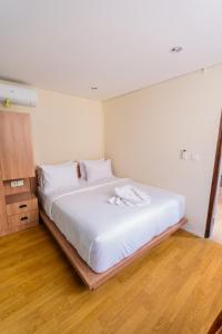 Postel nebo postele na pokoji v ubytování Samada Work Life Canggu
