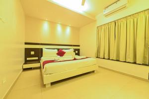 Voodi või voodid majutusasutuse Yuvraj Palace Inn toas