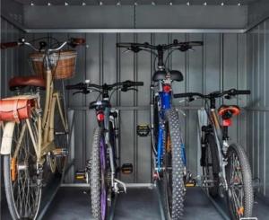 a group of bikes parked in a garage at Wildberry cycling in Lignieres-Orgeres