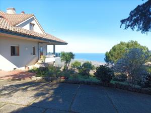 a house with a view of the ocean at Casa di Tota - Affittacamere in Vibo Valentia