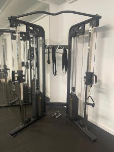 a gym with several tread machines in a room at El 66 de Cap Sa Sal in Begur +33 photos